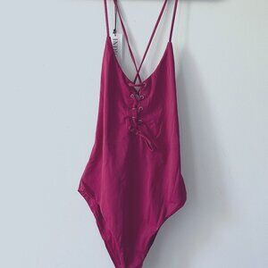 Indigo Swimwear - Red one piece bathing suit with front and back tie, Size Mediu